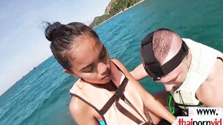 Petite amateur Thai barely legal Cherry giving head on a jet ski outside