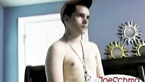 The attractive & sexy guy is smoking while he masturbates