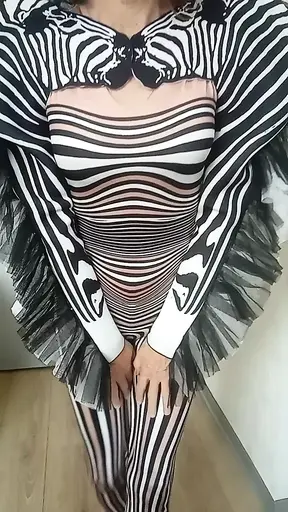 Wild zebra-themed outfit turns her on