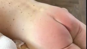 An OTK strapping and slippering