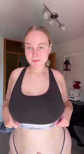 Amateur with big tits shows off her round ass