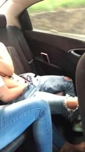 couple of horny girls kiss and have sex in my car.