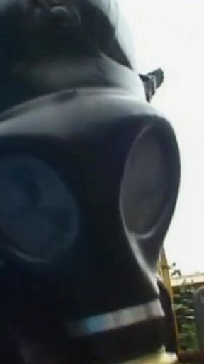 Dominating gas mask man