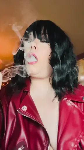 Smoking slutty milf in leather jacket dangles OMI