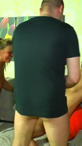 German blonde milf Anita teaches her busty blonde babe how to face a sexual threesome to get aroused and fully enjoy