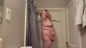 Fat bitch takes steaming hot shower and plays with herself