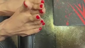 Red Nail Polish long toes on tiny feet Solo Desk