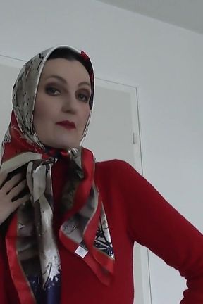 Lady Victoria Valente Showed Elegant Satin Headscarves with a Red Cashmere Turtleneck Sweater