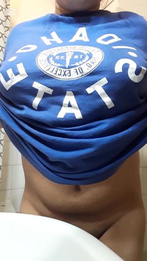 Indian mom wakes up early in the morning and plays with her big tits.