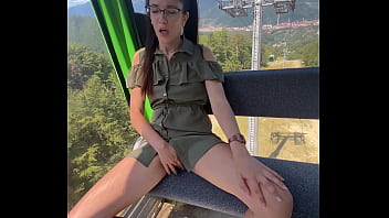 Masturbating in a cable ar outdoors