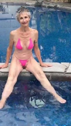 By the Hotel Pool in My Skimpy Pink Bikini