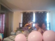 Milf with extreme long hair popping balloons and smoking cigarettes while filming up her own skirt