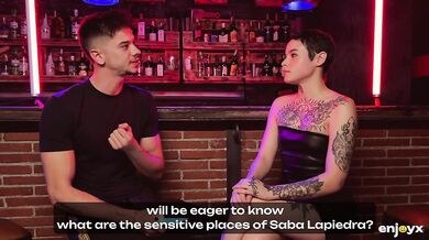 Obedient tattooed slut gets gagged and dominated by two rough guys in BDSM style