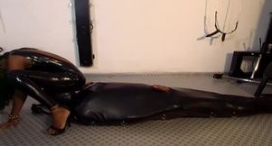 Humiliating face sitting in latex dress