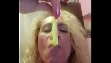 Playing with cum filled condom