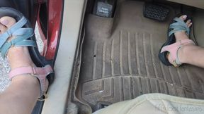 Fifi sensually pumping the pedals of her SUV in sexy open Teva sandals with pale pink toenail polish