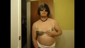 Nikki Smokes Seductively in Shiny Silver Bra CD Fetish Scene