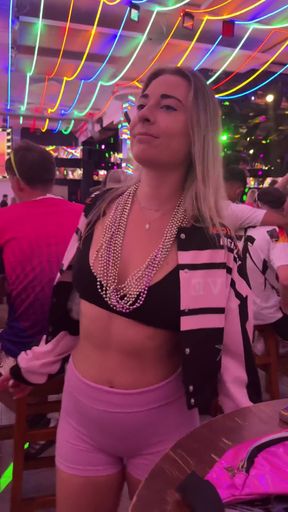 Natural babe shows off her boobs in public amateur setting