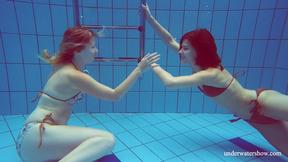 Blonde and Brunette babes swim naked