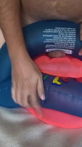 Playing with inflatable swim ring