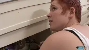 The plumber lezzie is having hot lesbian action in the kitchen with the amazing brunette