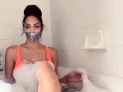 Eden self tape gagged in the bathtub