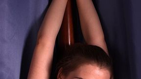 Cleavegagged Lisa, bound to the bed's post by her hands above her head and with her bare feet crossed and tied with hemp rope, is trying to free herself (HD MP4)