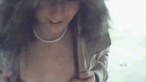 Horny and slutty blonde teen flashing her boobies on the webcam