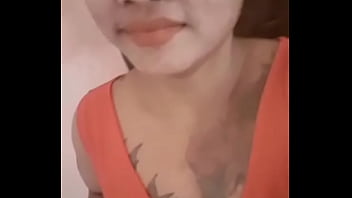 Beautiful Asian girl alone in her room
