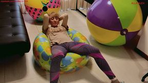 Alla quickly deflates three large beach balls