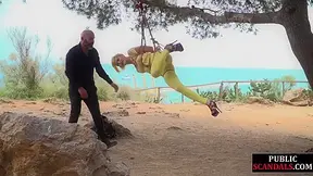 Femsub used in public suspension bondage with spanking