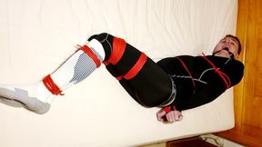 Man tied up by Miss M in tight leggings