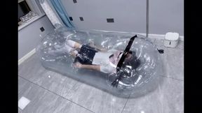 GG83-A cute Asian girl with white stockings and pigtails is trapped and struggling on a rubber boat.