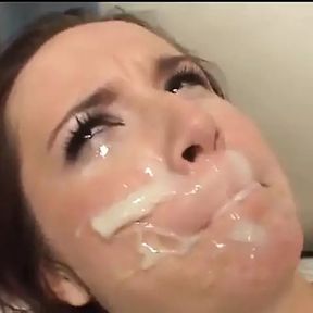 Lusty whore has warm cum running down her face after gang bang