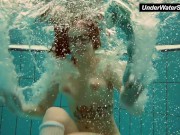 Big titted Dashka bounces body underwater