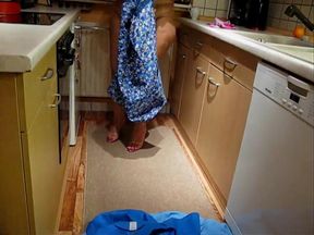 Mature German Lady Trying On Aprons