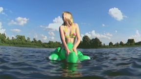 Alla rides a rare inflatable crocodile on the lake and fucks him hot!!!