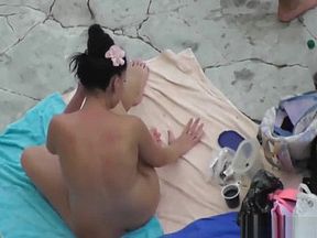 Stroking his dick on the beach made him fuck me