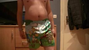 Sagging in black satin boxershorts and boardshorts