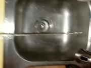 Sean takes a piss in the sink
