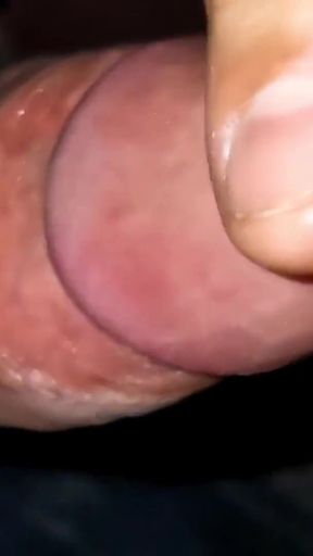 Playing with the head of a wet penis   Clip 1
