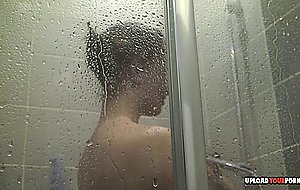 Hairy brunette washes her cunt in the shower —