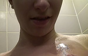 Hairy brunette washes her cunt in the shower —