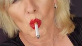 Smoker Mummy smoking sexy Marlboro Red 100 at the window waiting for you