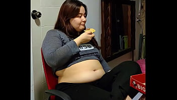 Big Belly Nicole Eating a Pizza