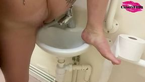 Golden Goddess Squirting Piss in Public Restroom Sink