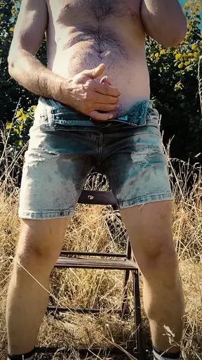 Scallyoscar piss drinking and soaking ripped denim shorts outdoor