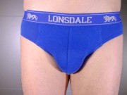Close up strip to underpants then show flaccid uncut penis and foreskin