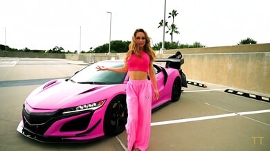 Blonde beauty Crystal Rush goes down on her date in a red-lit room after a ride in a pink sports car