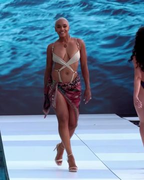 Fashion show model strutting on runway